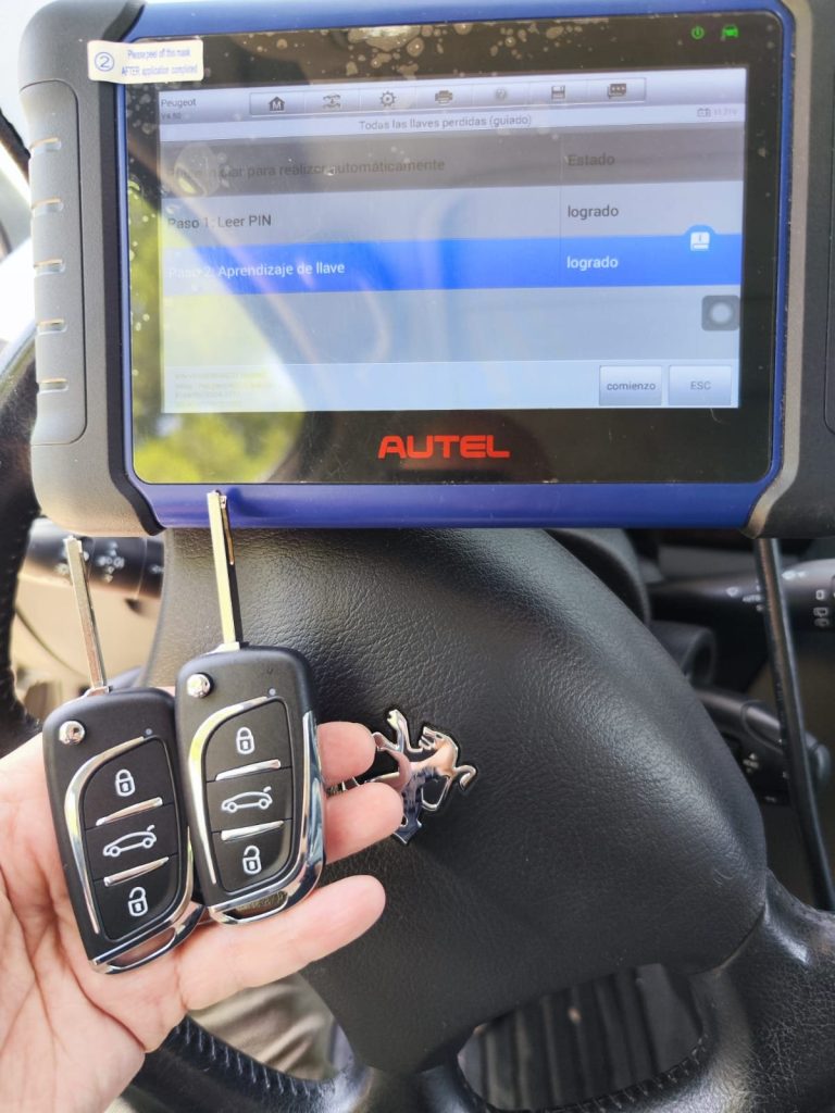 Programación de llave con mando de Peugeot